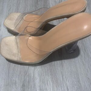 Never worn, purchased for $30. Gorgeous but too tall for me.